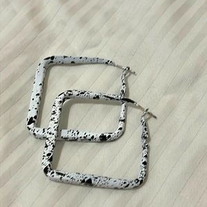 Black paint spotted earrings